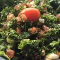 Tabbouleh · Parsley, tomatoes, scallions & cracked wheat tossed with extra virgin olive oil & herb dress...