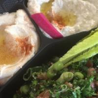 Starter Combo · Hummus, baba ganoush, tabbouleh salad.