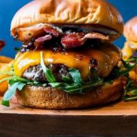 Truffle Burger · beef patty, bacon jam, truffle aioli, arugula, wisconsin cheddar, bacon
