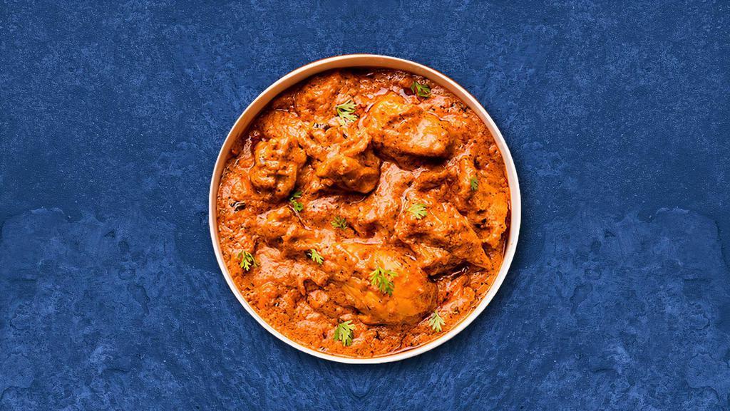 Terrific Tikka Masala  · Roasted chicken cooked with sliced onions and bell peppers, with tomato sauce and a touch of cream. Served with a side of rice.