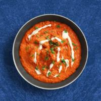 Bayside Butter Chicken · Boneless tenders of chicken cooked in a creamy tomato sauce with spices and finished with fe...