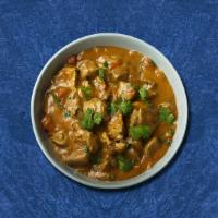 Clubhouse Chicken Curry · Chicken cooked with onion and a fresh and tangy tomato based sauce, seasoned with Indian spi...