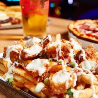Chicken Bacon Ranch Fries · Fries, cheddar, breaded chicken, bacon, green onions, ranch.