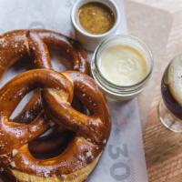 Salted Pretzels · Two pretzels, sea salt, stone-ground honey mustard, beer cheese.