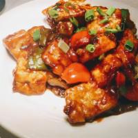 Chili Paneer · Fried paneer pieces sautéed with onions & colored peppers in homemade chili sauce.