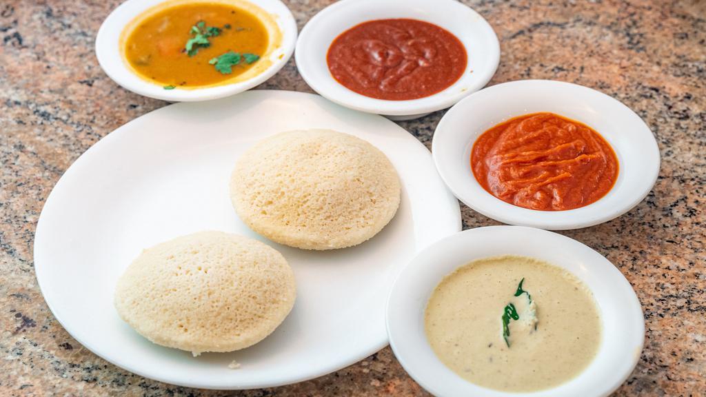 Plain Idli (2 Pieces) · Steamed rice cakes made with rice and lentils.