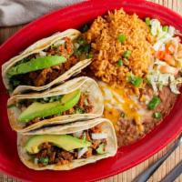 Chorizo Tacos (3) · Authentic, homemade chorizo in white corn tortillas, topped with avocado, cilantro and chopp...