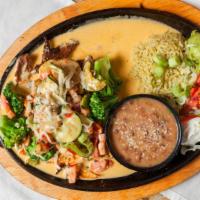 Padre Fajitas · Grilled chicken, shrimp and steak sauteed with broccoli, onions, green peppers, and mushroom...