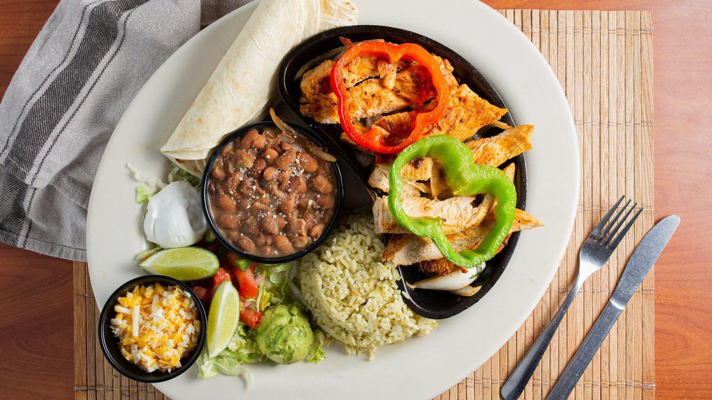 Grilled Chicken Fajita · Marinated grilled chicken breast, cheese, rice and beans. Served with flour tortillas.