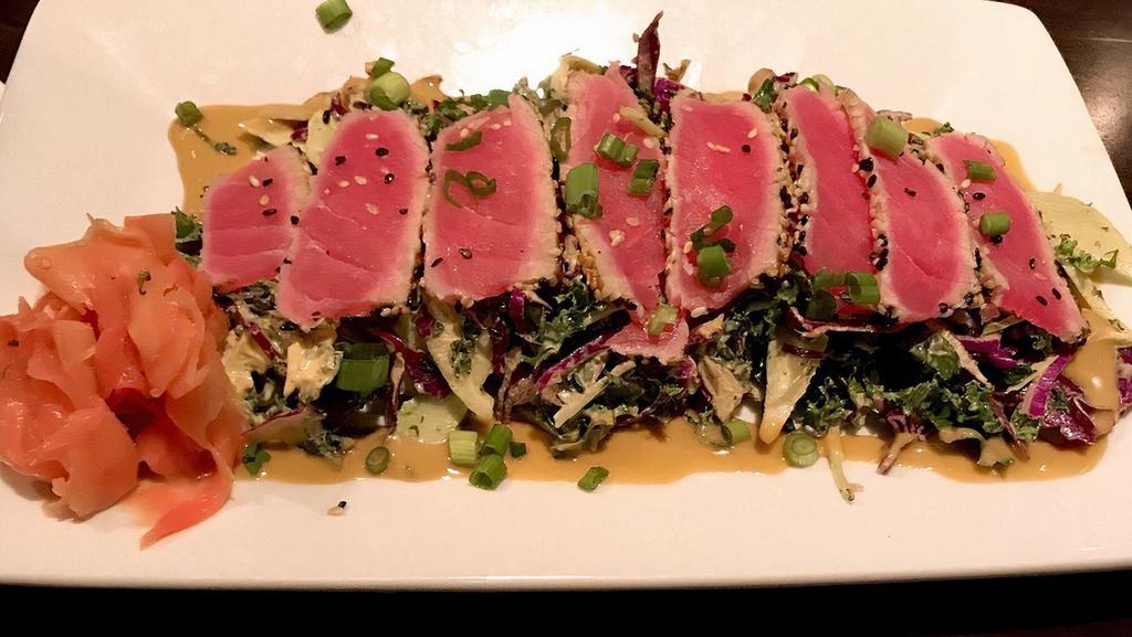 Sesame-Seared Ahi · Asian slaw, miso-ginger vinaigrette.

Consuming raw or undercooked meats, poultry, seafood, shellfish, or eggs may increase your risk for foodborne illness; contains (or may contain) raw or undercooked ingredients.