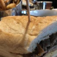 French Dip · Thinly sliced roasted prime rib, Provolone, french roll, au jus.

Consuming raw or undercook...