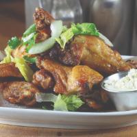 Chicken Wing Confit · B’s hot sauce and blue cheese dip. Pound.