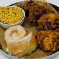 Southern Fried Chicken · Cinnamon sticky bun and creamed corn.