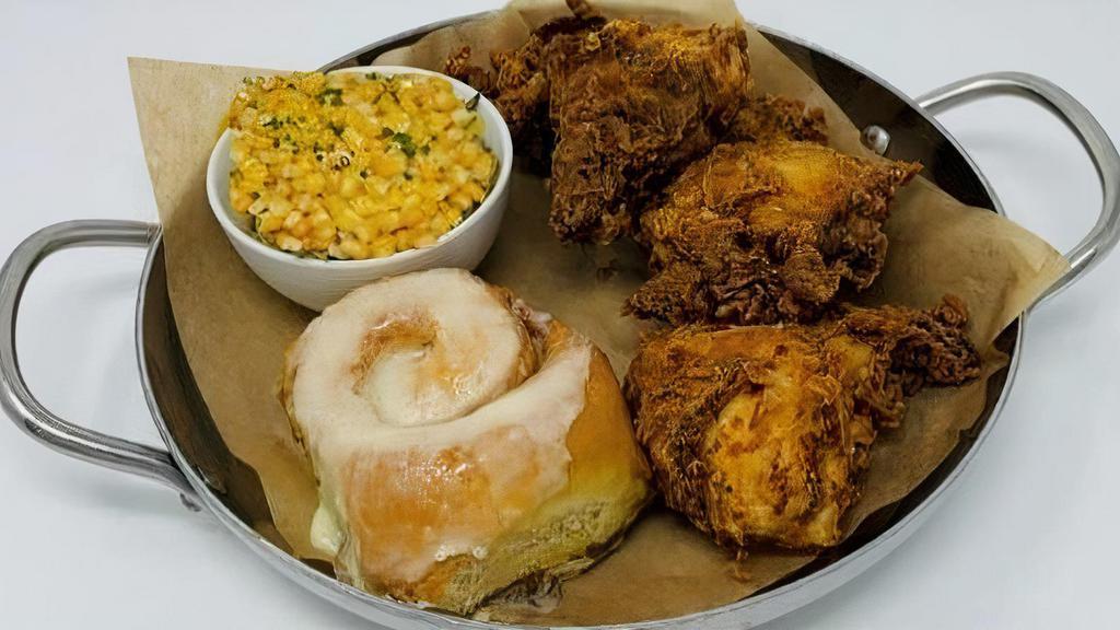 Southern Fried Chicken · Cinnamon sticky bun and creamed corn.
