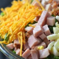 Chef Salad · Lettuce, tomato, cucumbers, swiss cheese, american cheese, ham, turkey croutons.