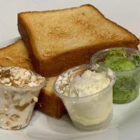 Sparrow Toast · Choice of whipped butter with sea salt, six-herb butter or caramelized shallot butter, straw...