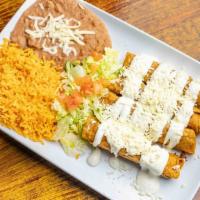 Flautas (3) · Three fried rolled corn tortillas filled with your choice of cheese, beef or chicken, topped...