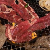 Bulgogi · Thinly sliced ribeye marinated in soy sauce garlic sesame oil and a variety of other korean ...