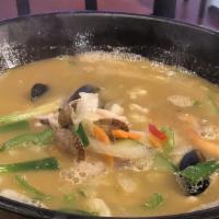  Jang Tuk Gook Bap Soup · Spicy Beef short rib with vegetable  in a Spicy Broth