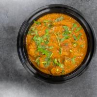 Lamb Curry · Boneless, lamb cooked with spices in thick curry sauce.