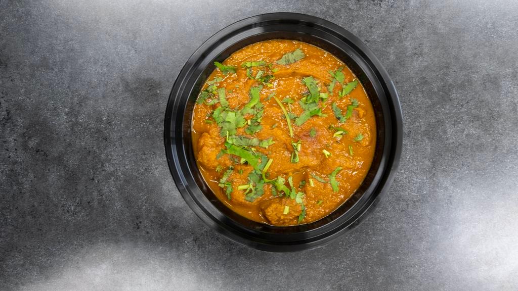Lamb Curry · Boneless, lamb cooked with spices in thick curry sauce.