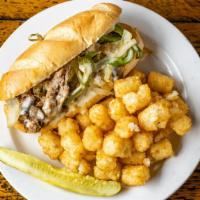Philly Cheese Steak · Sliced ribeye, swiss, green pepper, grilled onion, mushroom, mayo, classic Philly roll.