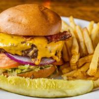 All American Burger · American cheese, applewood smoked bacon, lettuce, tomato, pickle, and red onion.