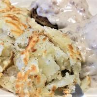 Country Benedict · Sausage patties, poached eggs and creamy sausage gravy.