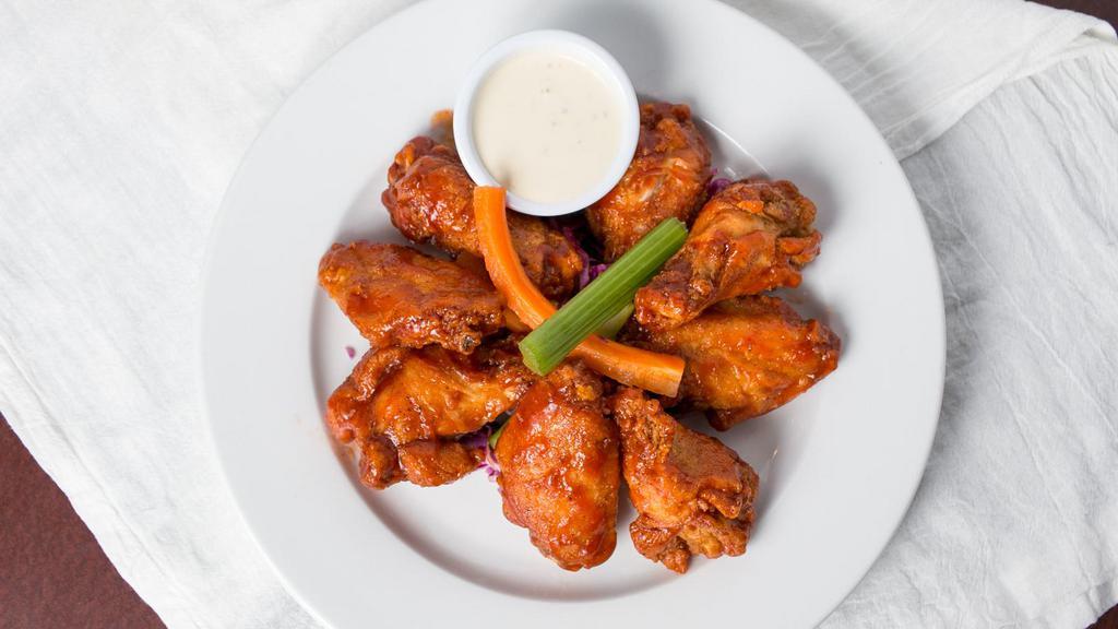 State Street Wings · Seasoned and fried wings in your choice of flavor, with celery and carrots, bleu cheese or house dressing for dipping

**Due to current wing shortages, wing portions will be weighed. An 8 piece will be 1.5 pounds (approximately 8 - 10 wings. A 12 piece will be 2.25 pounds (roughly 12 - 14 wings). Sizes of wings will vary.**