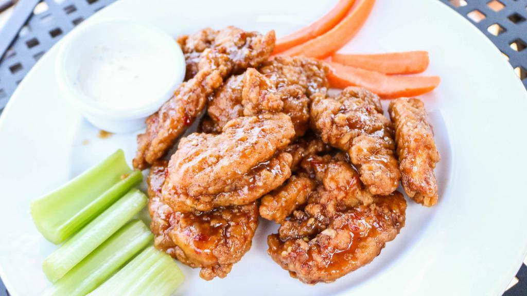 Tossed Tenders · 1 lb (roughly 8 - 10) chicken tenders tossed in your choice of sauce. Served with a side of carrots and celery, and your choice of dipping sauce.