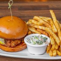 Buttermilk Fried Chicken Sandwich · Your choice of Nashville hot or original buttermilk fried chicken topped with pickle rounds ...
