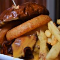 Saz'S Pub Burger · Half pound Wagyu patty, beer-battered onion rings, Wisconsin beer cheese sauce, smoked bacon...