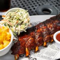 Saz'S Signature Bbq Back Backribs · Two full racks smothered in Saz’s signature BBQ sauce, served with coleslaw and burnt end ba...