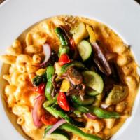 Loaded Mac · Cavatappi pasta, house-made cheese sauce, toasted panko topped with your choice of item for ...