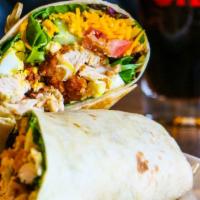 Buttermilk Chicken Cobb Wrap · A toasted flour tortilla stuffed with fried chicken breast, mixed greens, purple onion, toma...