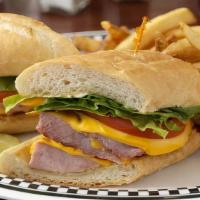 Ham & Cheese Supreme · Ham, American cheese, lettuce, tomato & mayo. Served on toasted French bread.