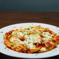 Mostaccioli Alforno Pasta · Baked penne noodles, ricotta, mozzarella and marinara sauce. Served with garlic bread and gr...