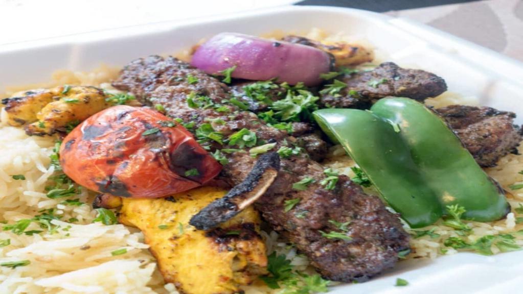 Combination Feast · Combo of shish kabob, kafta kabob and chicken. Served with rice, salad, and pita bread.