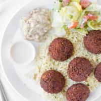 Falafel Plate · Vegetarian. 6 deep fried patties, baba ghanouj, rice and salad