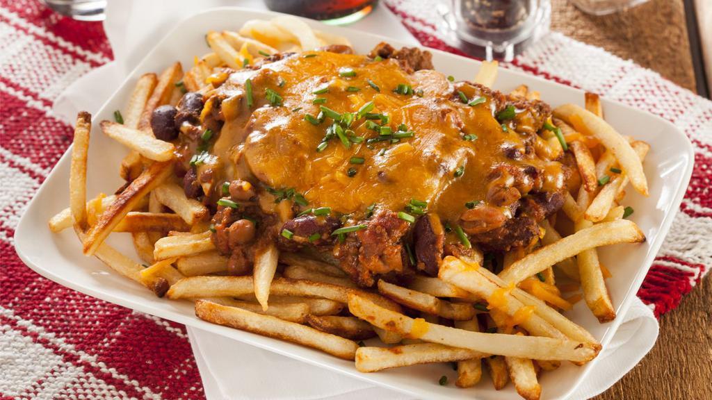 Chili And Cheese Fries · Golden fries covered with zesty chili.