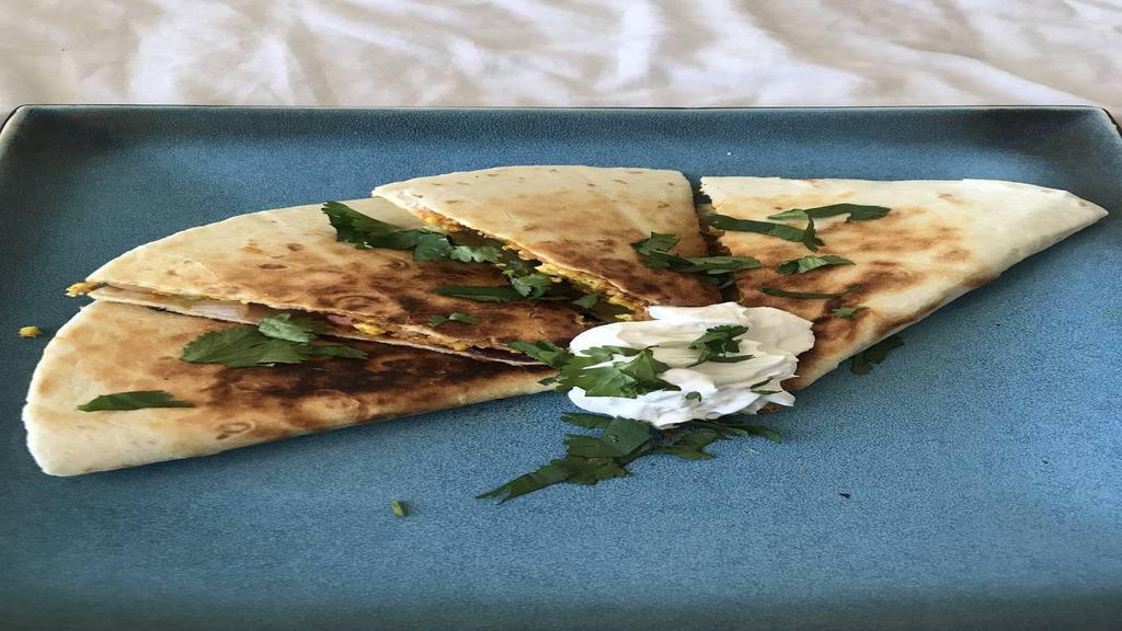 The Queso Quesadilla · Quesadilla, vegetarian, appetizers traditionally made corn tortillas, these quesadillas are stuffed with cheese and our customized spices.