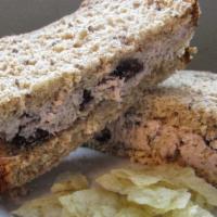 Cranberry Tuna Salad Sandwich · Oil free tuna delight with cranberries, mayo, herbs and spices with plain potato chips.