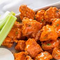 Boneless Chicken Wings · Pieces of all-white, boneless chicken breast lightly breaded and cooked to crisp perfection,...