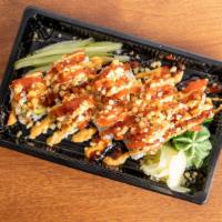 Crunchy Sriracha Roll · Spicy tuna, imitation crab, and cucumber topped with sriracha peas, Japanese bbq sauce, and ...
