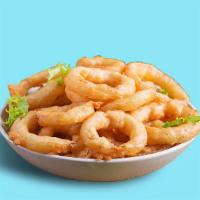 Onion Halo Crisps · Rings of sliced onion coated with batter and fried until crispy.