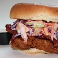 Low Blow Slaw Bomb · a collaboration with Fartley Farms habanero hot sauce, apple slaw and bacon