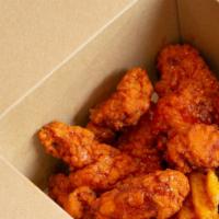 Boneless Wing Basket · 10 wings tossed in your choice of sauce, served with waffle fries and bangin’ ranch for dunk...