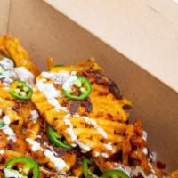 Loaded Waffle Fries · cheddar, bacon, jalapeno, bangin‘ ranch & fancy sauce for dunking.