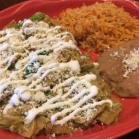 D-Traditional Chilaquiles · Shredded chicken, onion, jalapeño peppers and corn tortilla chips sautéed in a green tomatil...