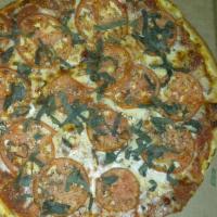 Pizza Margherita · Fresh tomato and basil on extra thin crust.